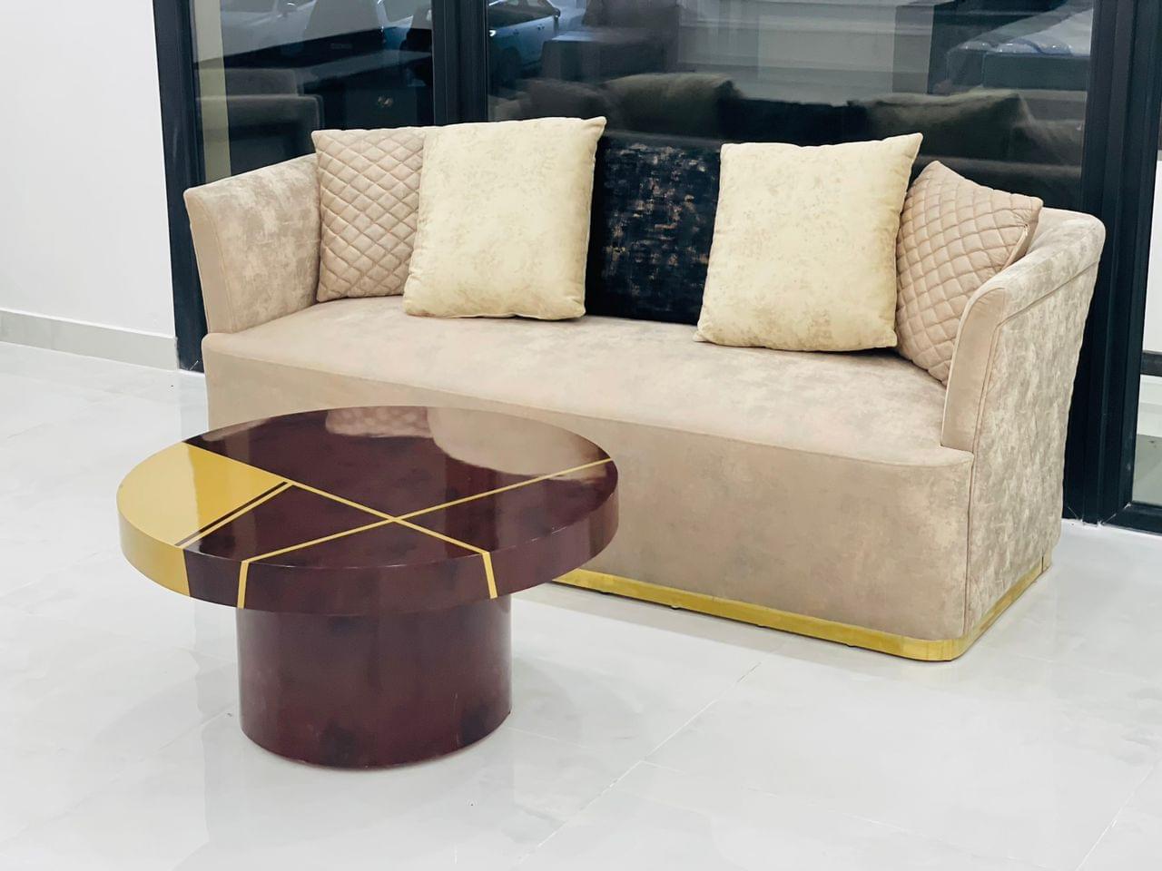 Ultimate Comfort: Quilted Velvet Sofa with Bold Wood & Gold Table